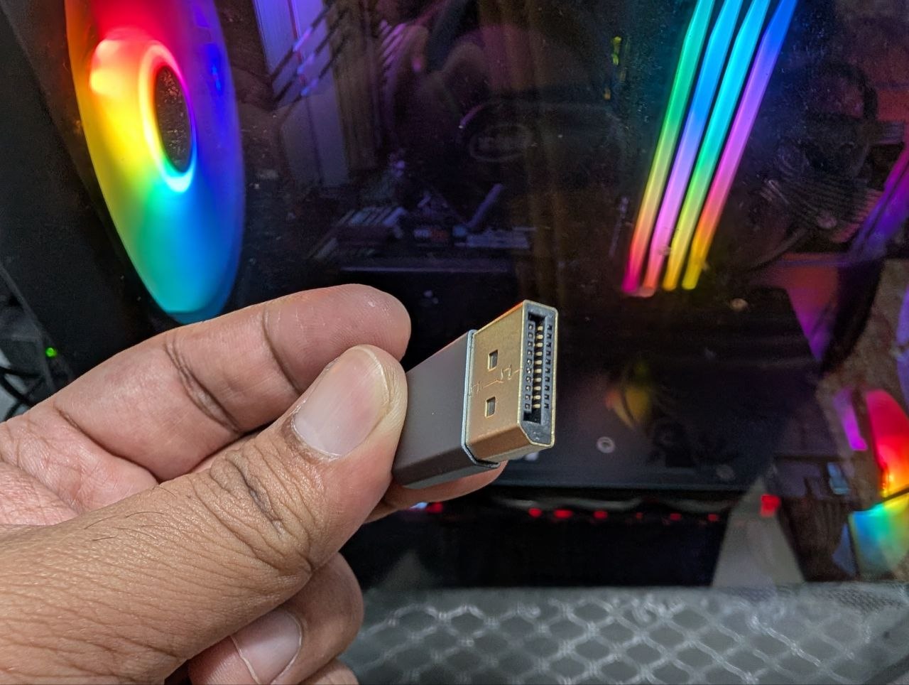 DisplayPort dummy plug held for scale